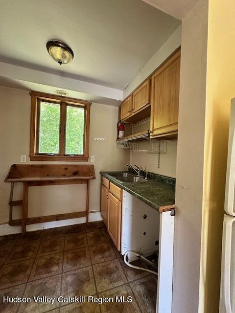 725 Highway 32 Tillson, NY 12486 - Photo 21 of 26 a kitchen with stainless steel appliances granite countertop a stove and a sink