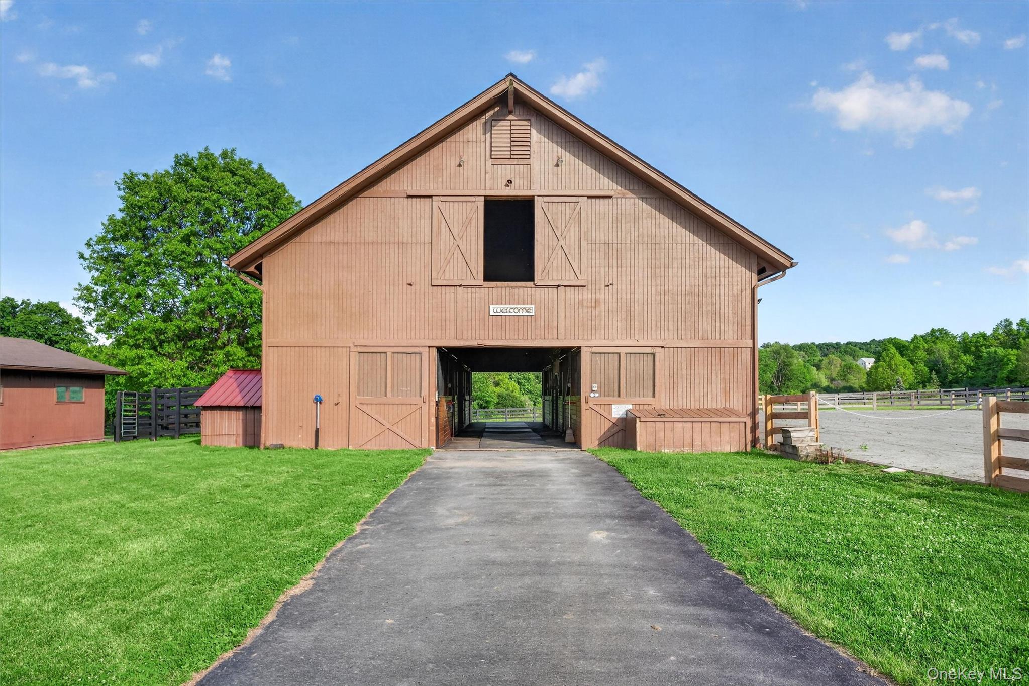 165 Hasbrouck Road Goshen, NY 10924 - Photo 4 of 50 The classic main barn has easy access to the stone dust ring, and the large loft holds plenty of bales