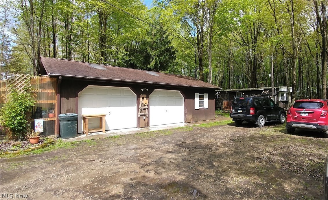 3948 Ayers Road Dorset, OH 44032 - Photo 2 of 20 Double garage with a heated attached workshop on side (not shown)