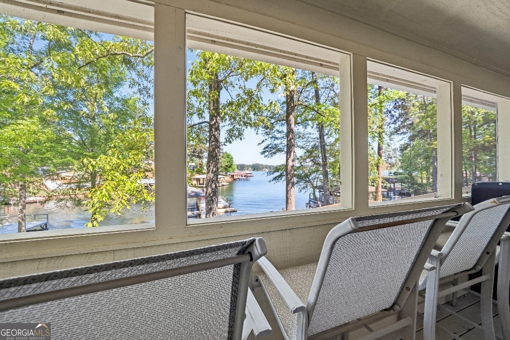 730 Marigold Road Sparta, GA 31087 - Photo 11 of 35 a view of a room with a large window and table