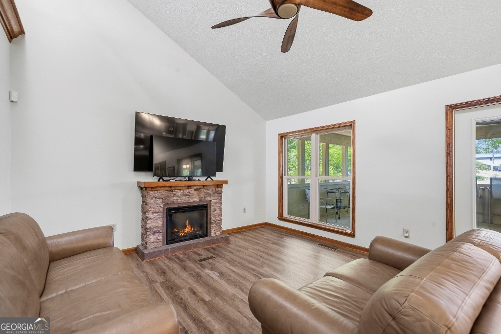 730 Marigold Road Sparta, GA 31087 - Photo 15 of 35 a bedroom with a bed and a flat screen tv