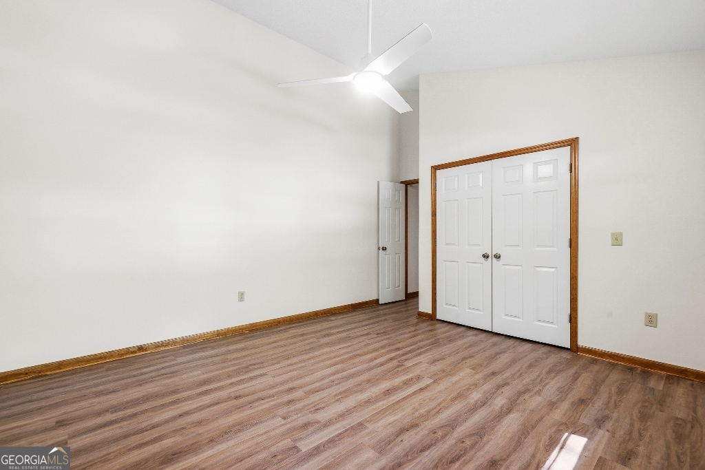 730 Marigold Road Sparta, GA 31087 - Photo 28 of 35 an empty room with wooden floor