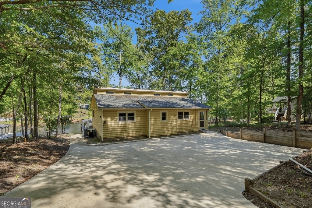 730 Marigold Road Sparta, GA 31087 - Photo 31 of 35 a view of a house with a yard