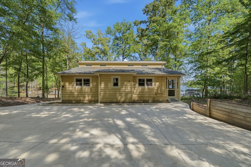 730 Marigold Road Sparta, GA 31087 - Photo 35 of 35 a front view of a house with a garden