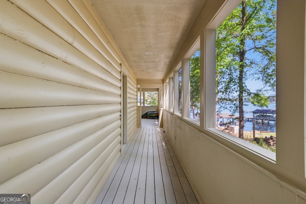 730 Marigold Road Sparta, GA 31087 - Photo 8 of 35 a view of a balcony with wooden floor