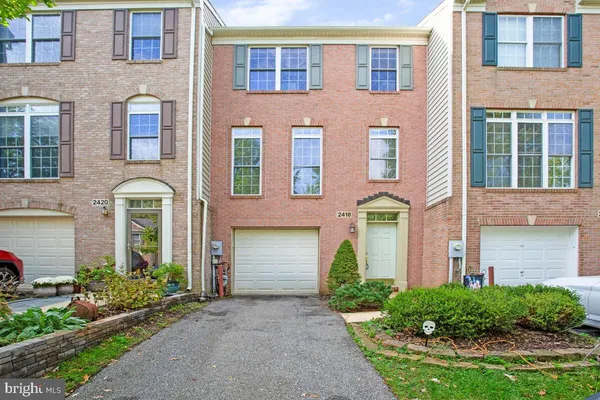 a front view of a house having yard