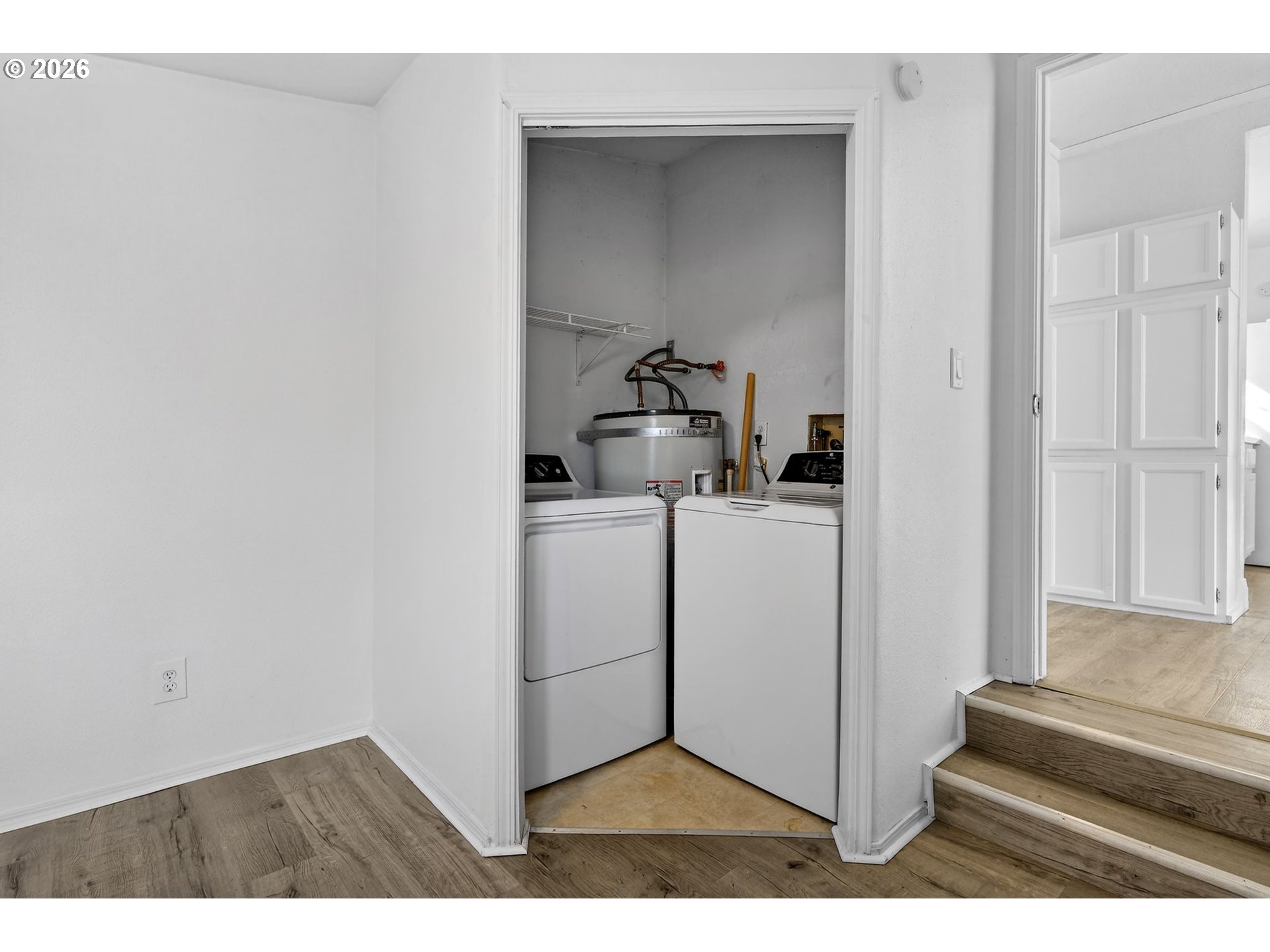 134 South 3rd Street St. Helens, OR 97051 - Photo 12 of 21 a utility room with cabinets washer and dryer