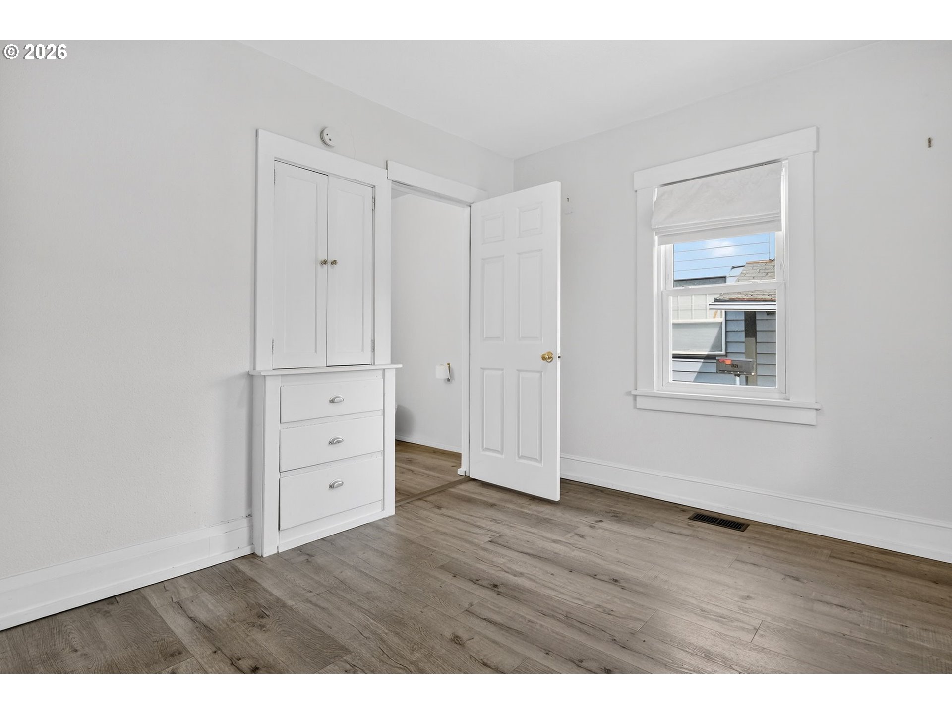 134 South 3rd Street St. Helens, OR 97051 - Photo 14 of 21 a view of an empty room with wooden floor