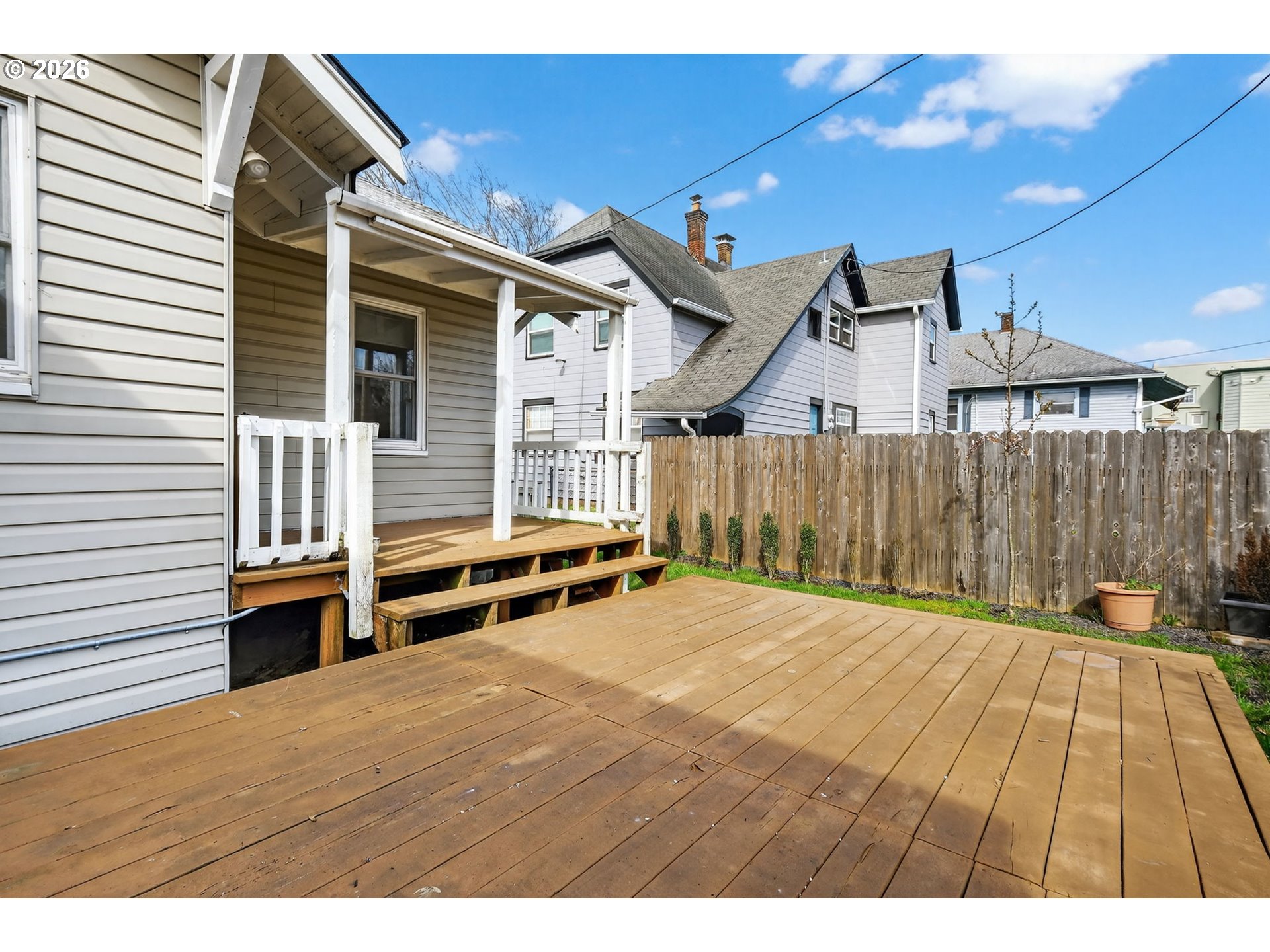 134 South 3rd Street St. Helens, OR 97051 - Photo 19 of 21 a view of backyard with wooden floor and iron fence