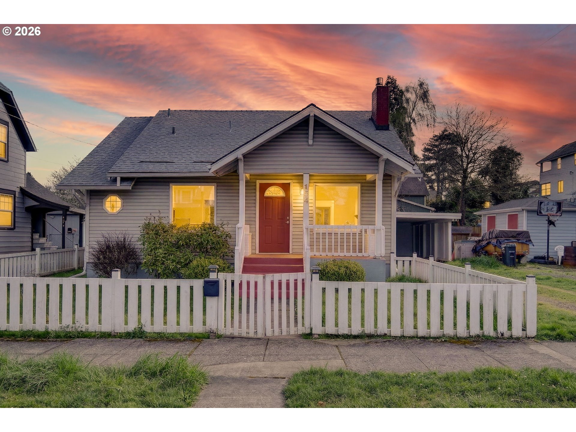 134 South 3rd Street St. Helens, OR 97051 - Photo 21 of 21 a view of a house with wooden fence next to a yard