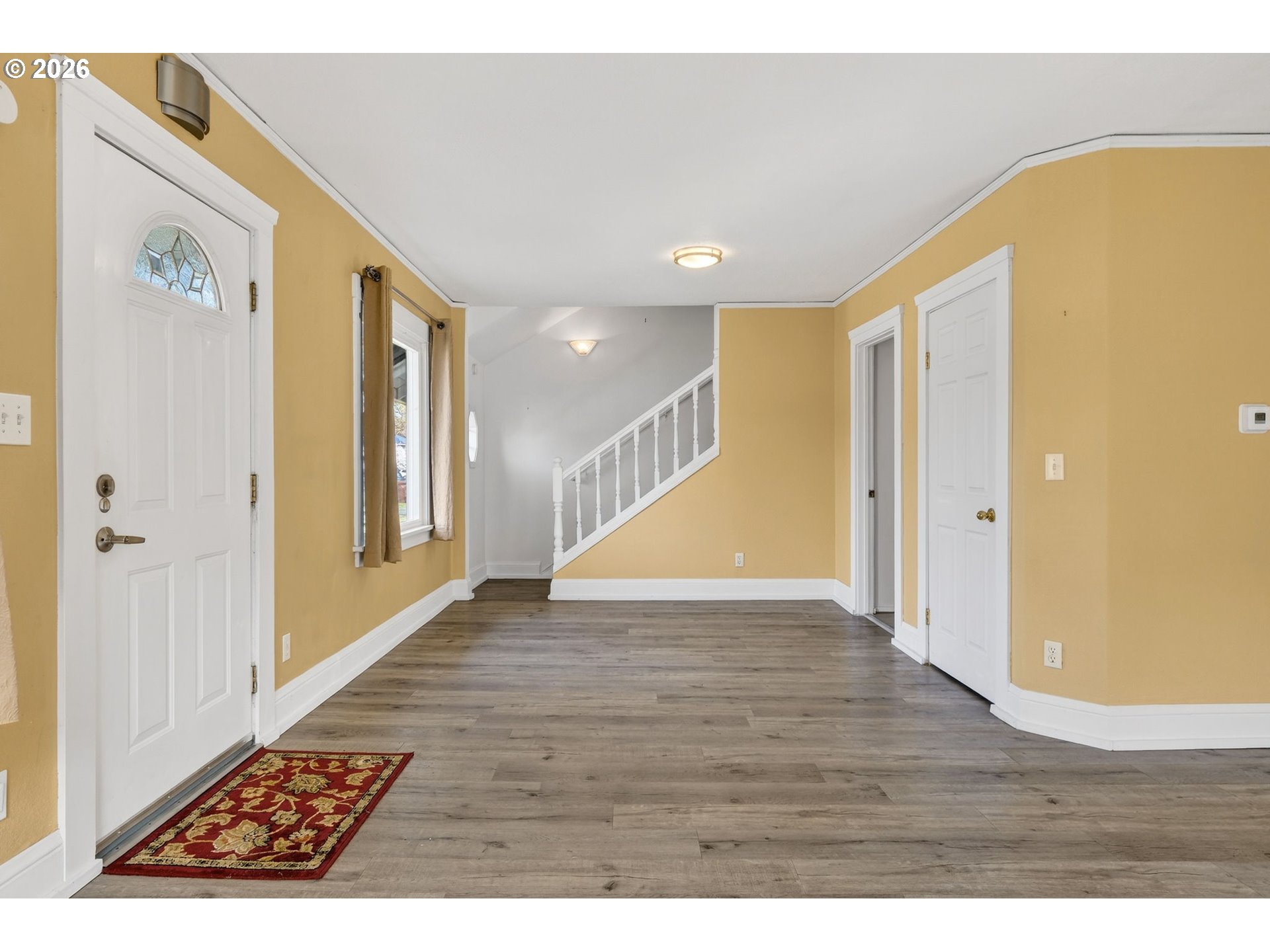 134 South 3rd Street St. Helens, OR 97051 - Photo 6 of 21 a view of an entryway with wooden floor