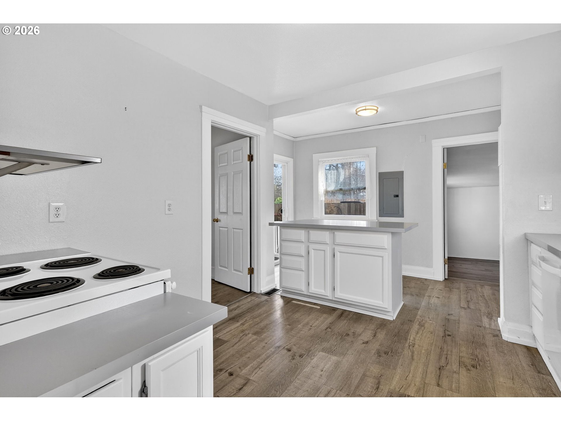 134 South 3rd Street St. Helens, OR 97051 - Photo 9 of 21 a kitchen with a refrigerator and a stove top oven