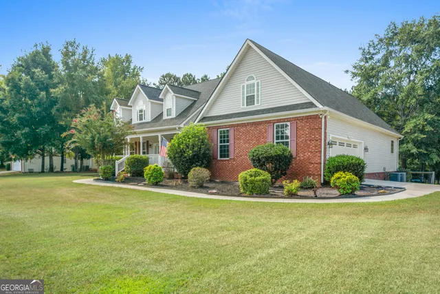 a view of a balcony with wooden floor