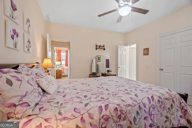 a bathroom with a shower curtain and a sink