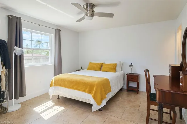 a bathroom with a sink toilet and mirror