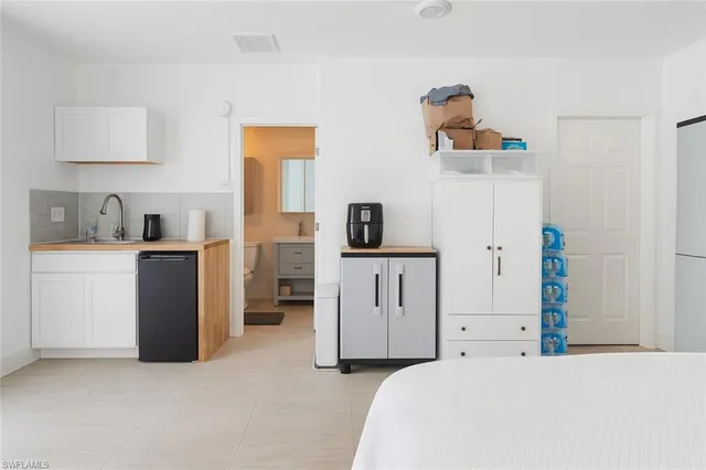 a view of workspace with furniture and natural light