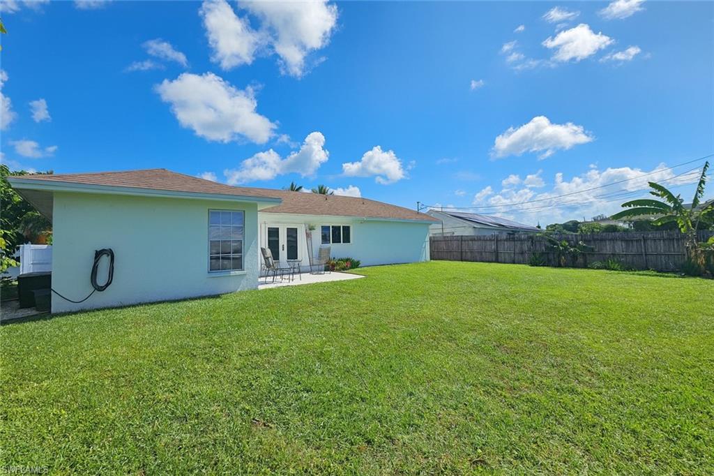 5010 31st Avenue Southwest Naples, FL 34116 - Photo 29 of 33 a front view of a house with garden