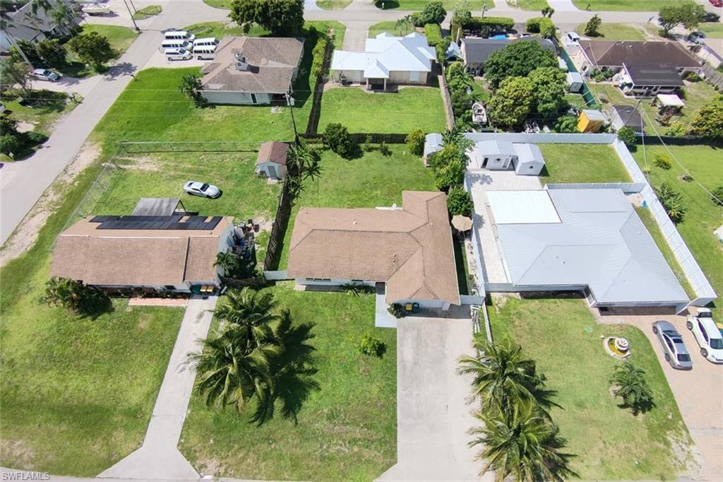 5010 31st Avenue Southwest Naples, FL 34116 - Photo 30 of 33 an aerial view of residential houses with outdoor space and swimming pool