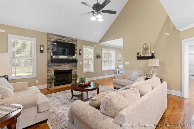 a living room with furniture and window