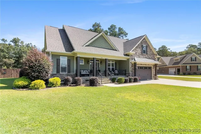 a bathroom with a toilet and shower