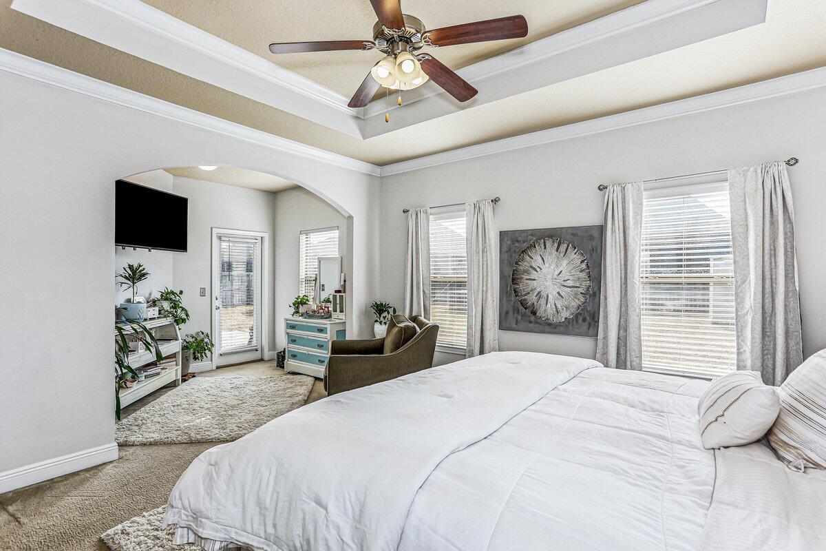 405 Pendo Place Crestview, FL 32536 - Photo 15 of 39 a bedroom with a bed and a large window