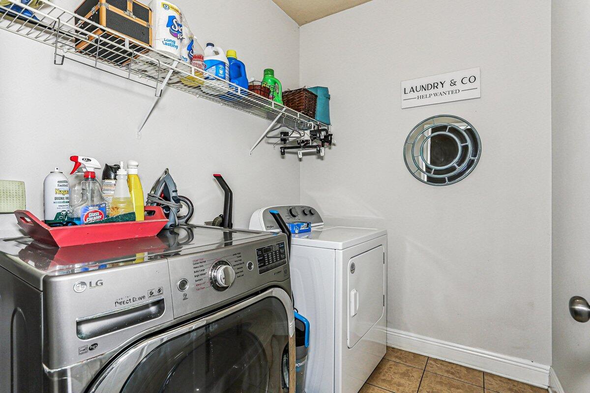 405 Pendo Place Crestview, FL 32536 - Photo 30 of 39 a utility room with dryer and washer