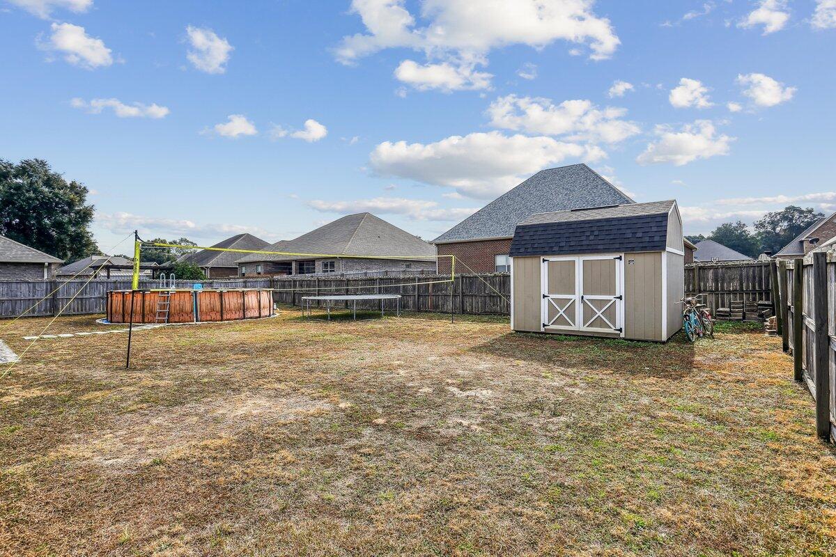 405 Pendo Place Crestview, FL 32536 - Photo 35 of 39 a house view with a garden space