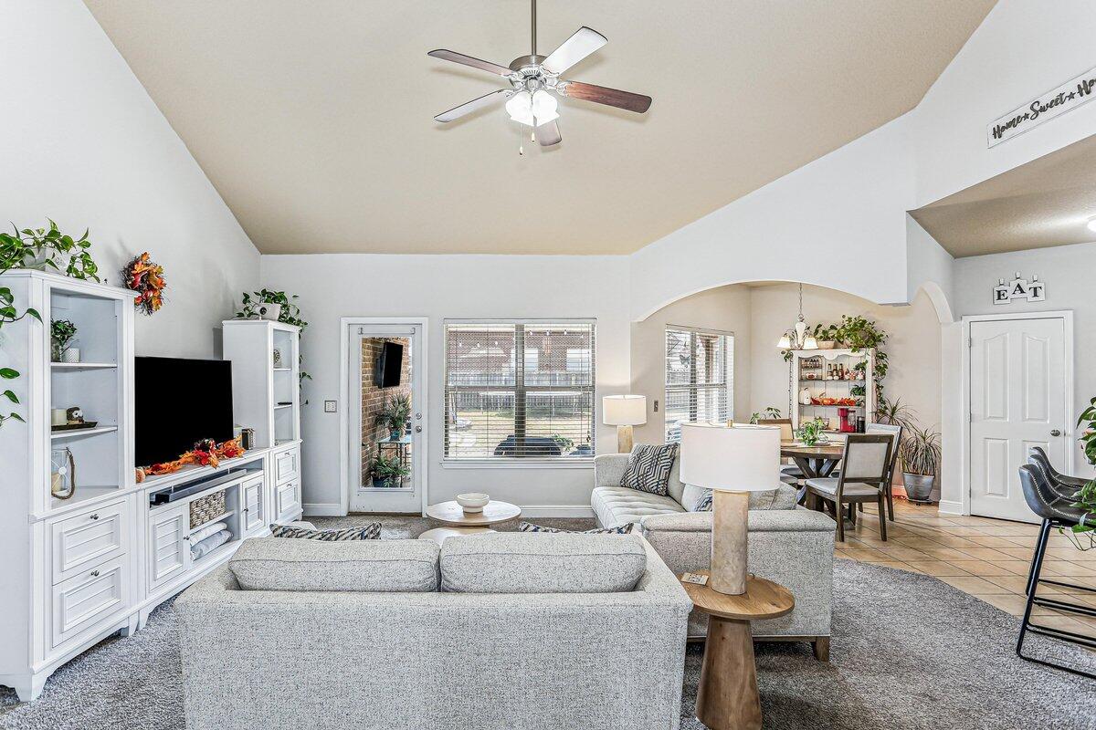 405 Pendo Place Crestview, FL 32536 - Photo 4 of 39 a living room with furniture and a flat screen tv