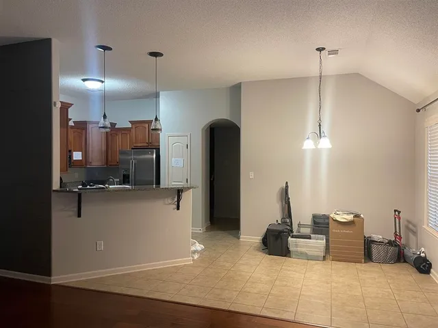 a bathroom with a sink a vanity and mirror
