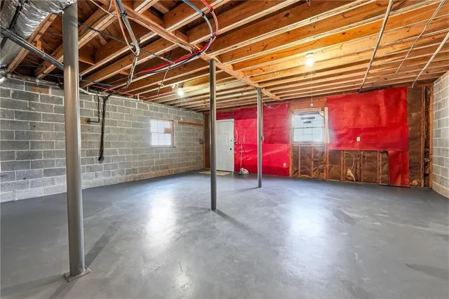 a view of a house with basketball court