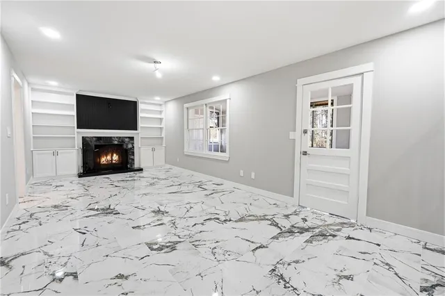 a bed room with a bed and a television