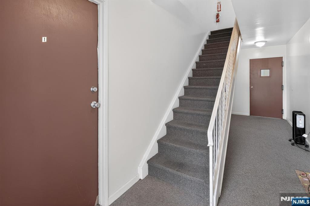 192 Burnett Avenue Maplewood, NJ 07040 - Photo 12 of 13 a view of entryway and hall with wooden floor