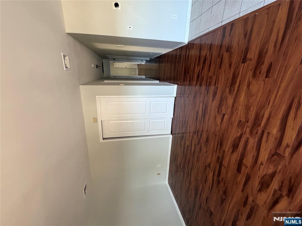 192 Burnett Avenue Maplewood, NJ 07040 - Photo 2 of 13 a view of empty room with wooden floor