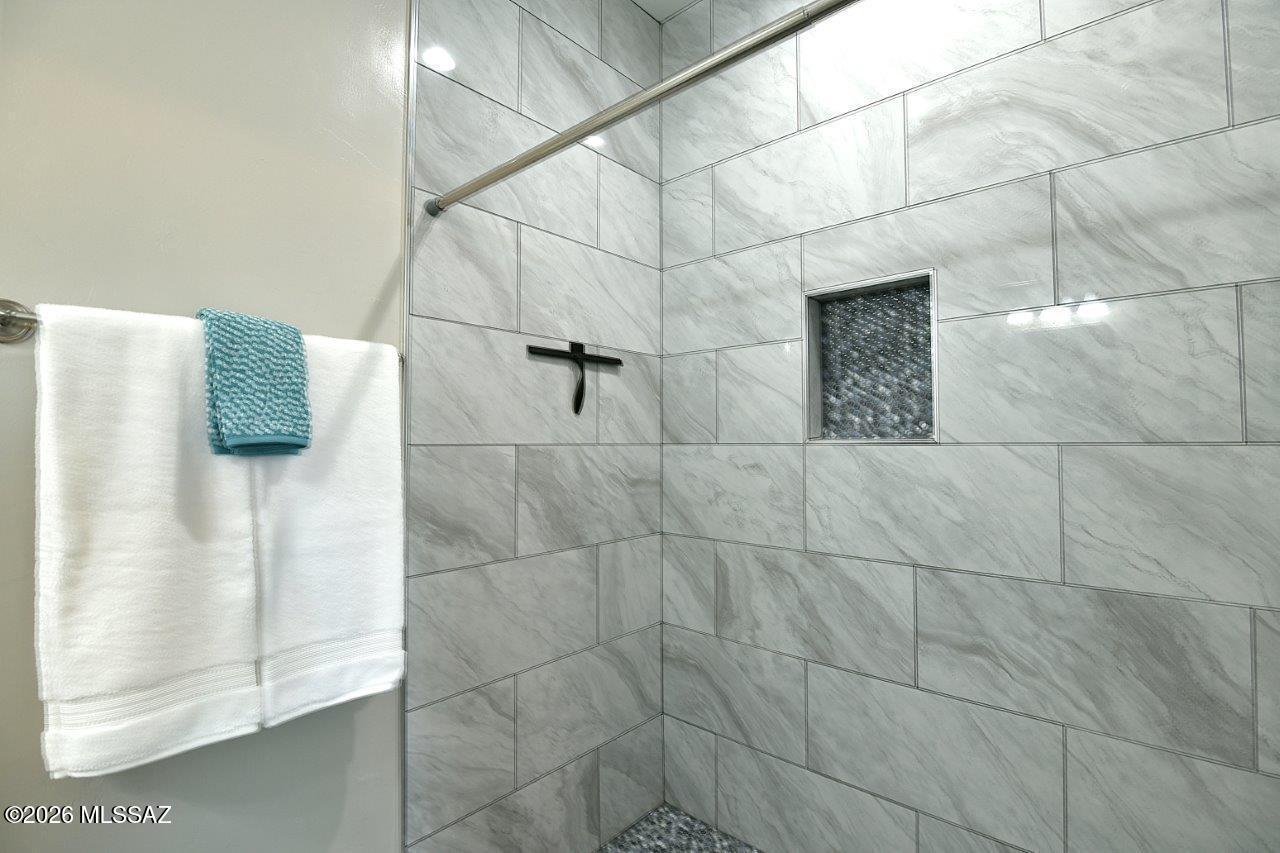 1091 North Vail View Road Vail, AZ 85641 - Photo 19 of 43 a bathroom with a shower