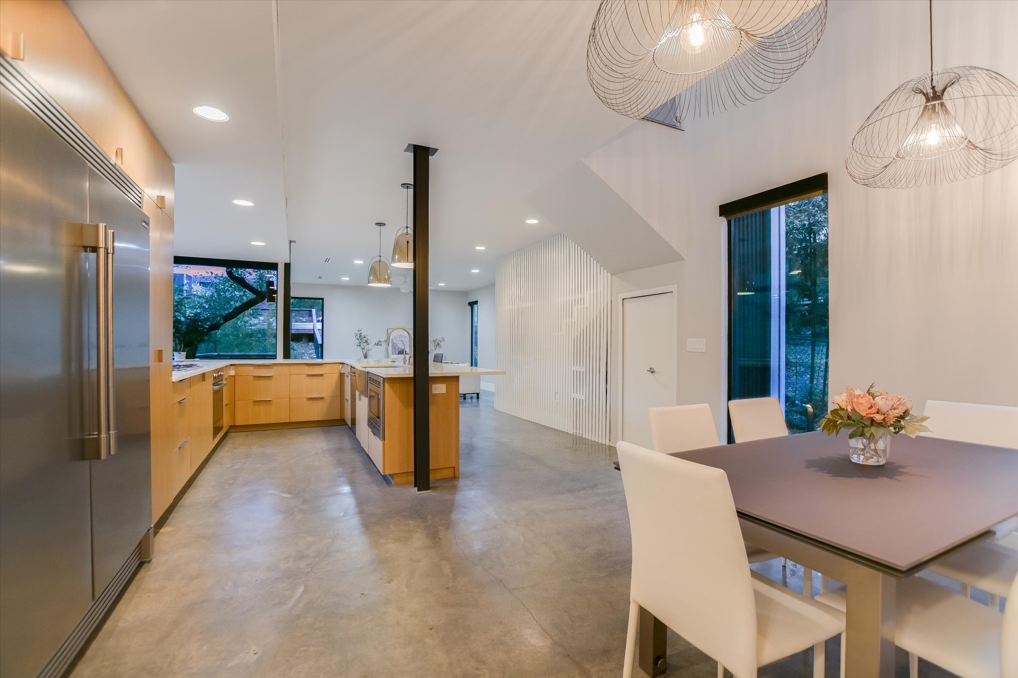 1325 Bonham Terrace, Unit A Austin, TX 78704 - Photo 6 of 25 a dining room with furniture and a floor to ceiling window