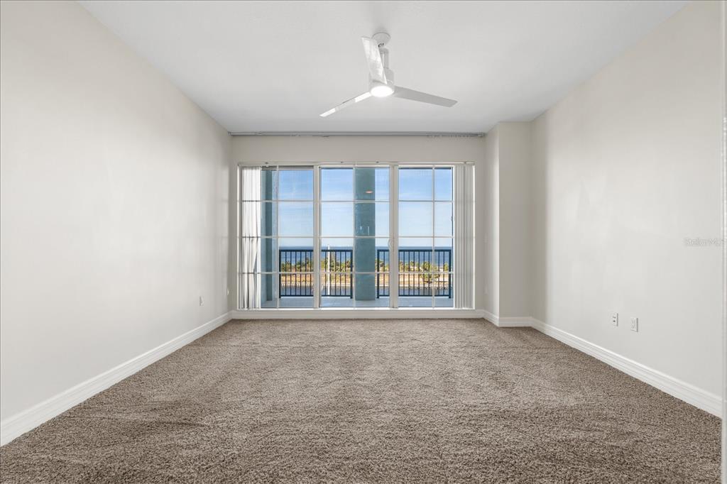 536 Bahia Beach Boulevard, Unit 428C Ruskin, FL 33570 - Photo 12 of 30 an empty room with a window