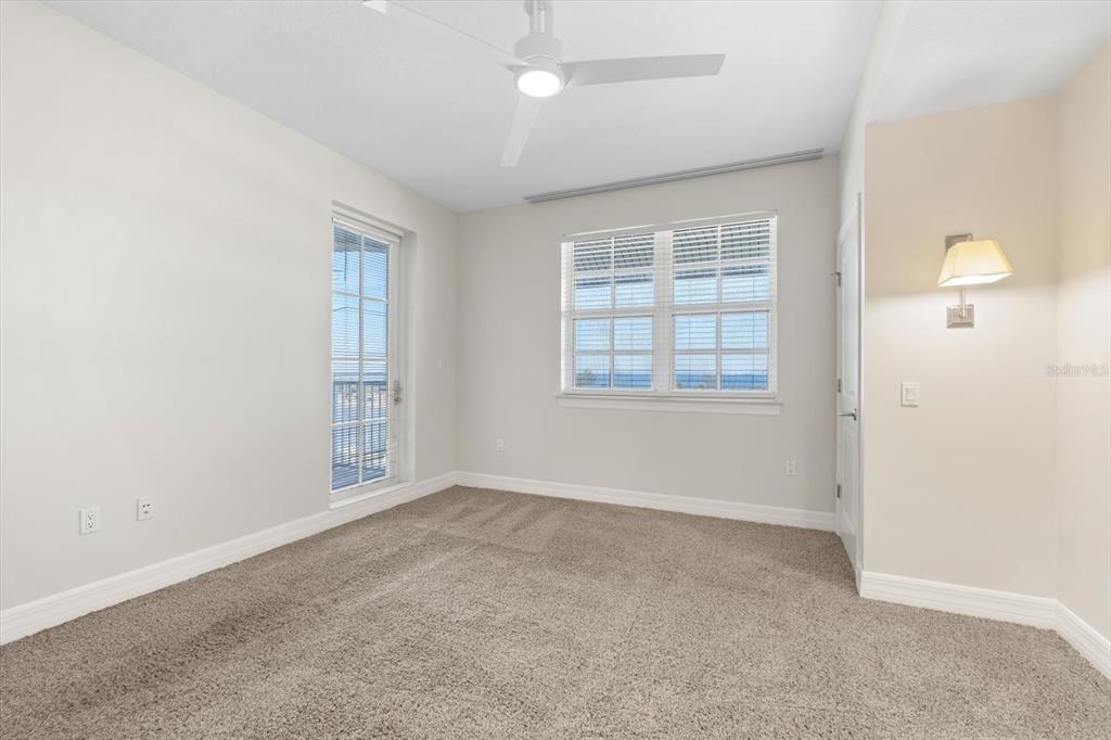 536 Bahia Beach Boulevard, Unit 428C Ruskin, FL 33570 - Photo 17 of 30 an empty room with windows and closet