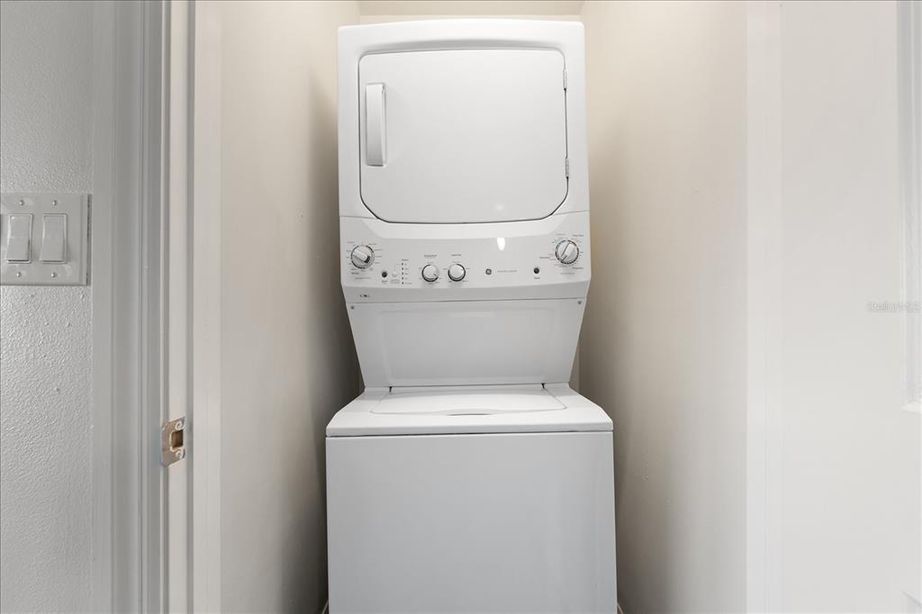 536 Bahia Beach Boulevard, Unit 428C Ruskin, FL 33570 - Photo 19 of 30 a utility room with dryer and washer