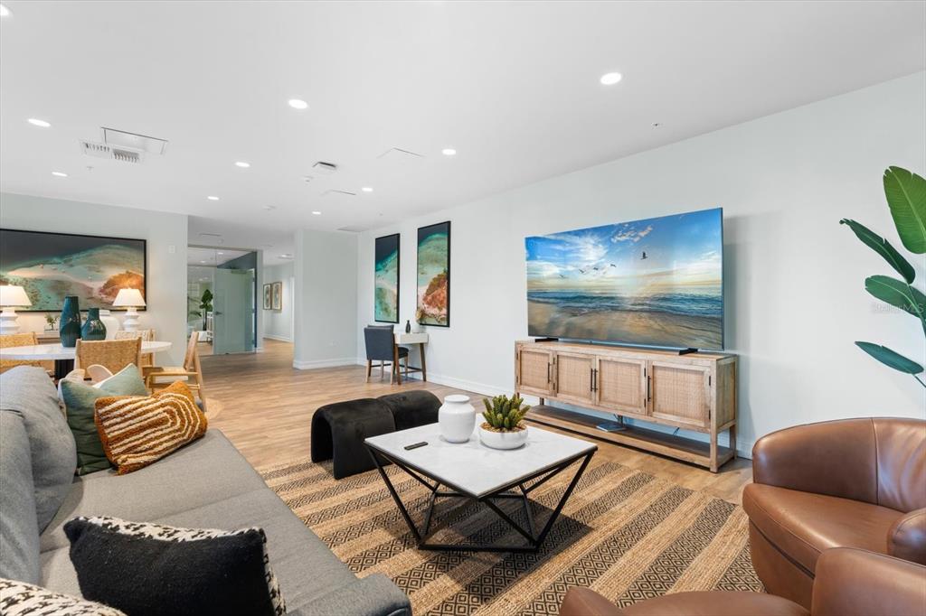 536 Bahia Beach Boulevard, Unit 428C Ruskin, FL 33570 - Photo 30 of 30 a living room with furniture and a flat screen tv