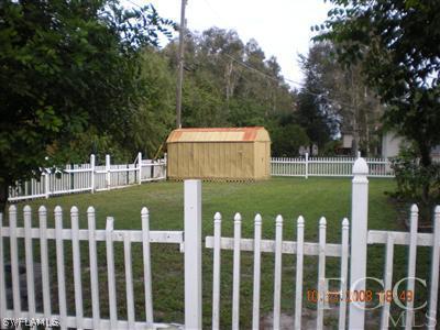 17160 Lee Road Fort Myers, FL 33967 - Photo 10 of 10 a front view of a house with garden