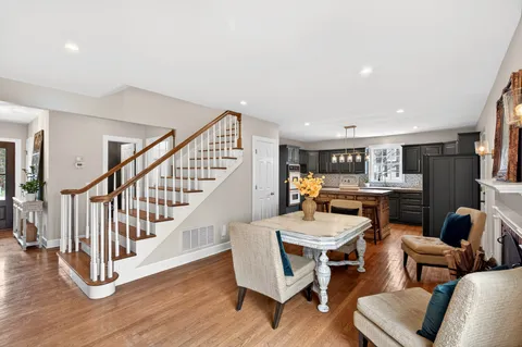 a room with furniture and a wooden floor