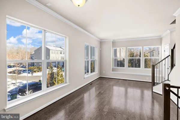 a bathroom with a bathtub and a window