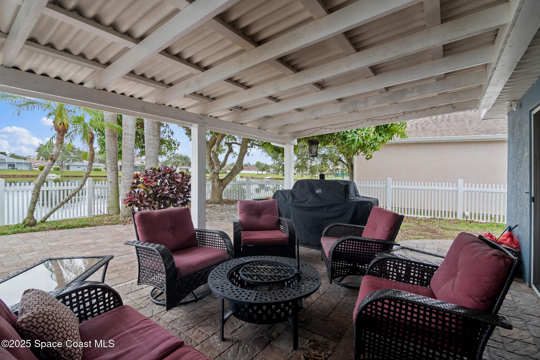 443 Wenthrop Circle Rockledge, FL 32955 - Photo 24 of 38 a outdoor living space with furniture and garden view