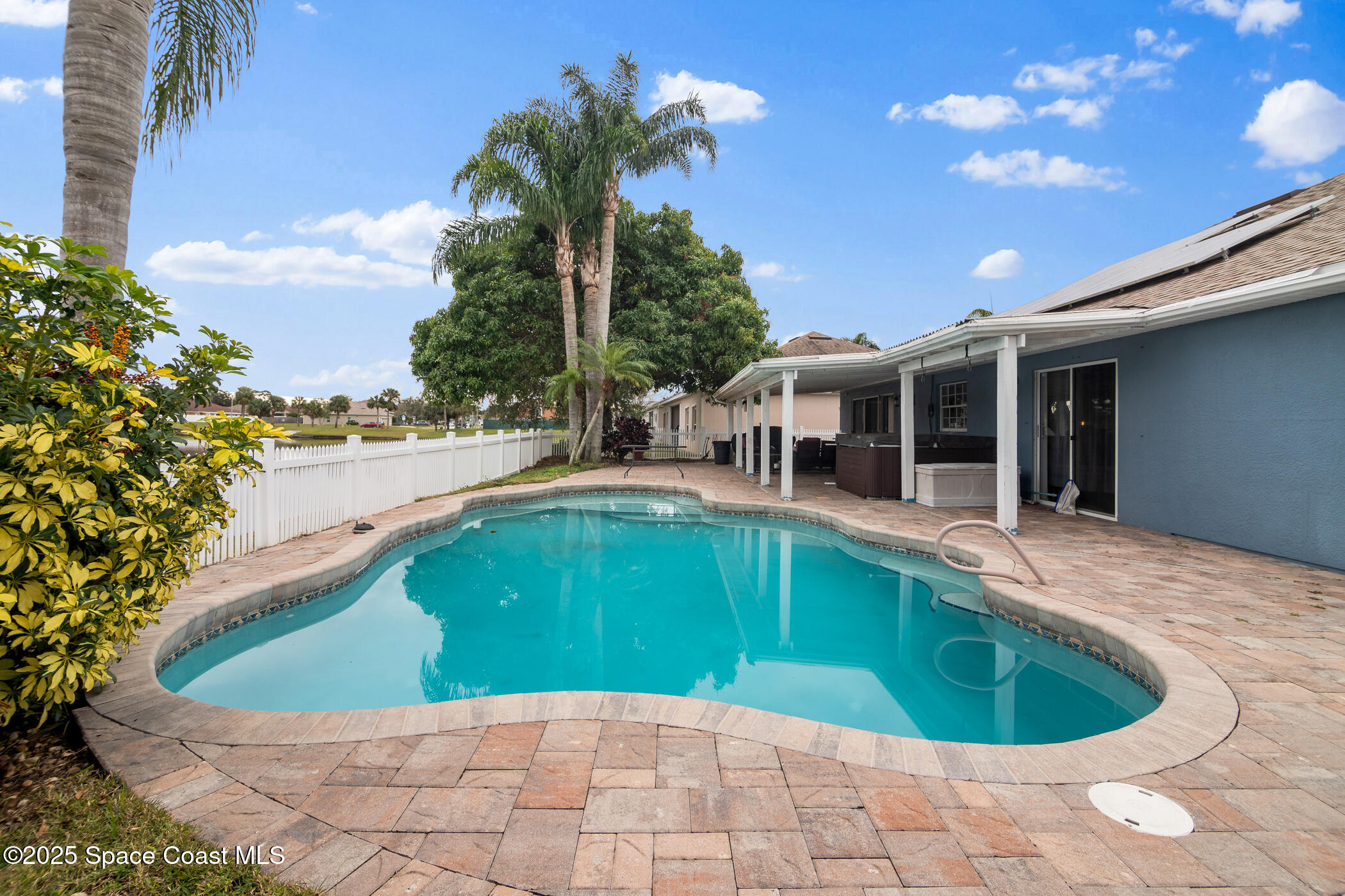443 Wenthrop Circle Rockledge, FL 32955 - Photo 28 of 38 a view of a house with backyard and sitting area