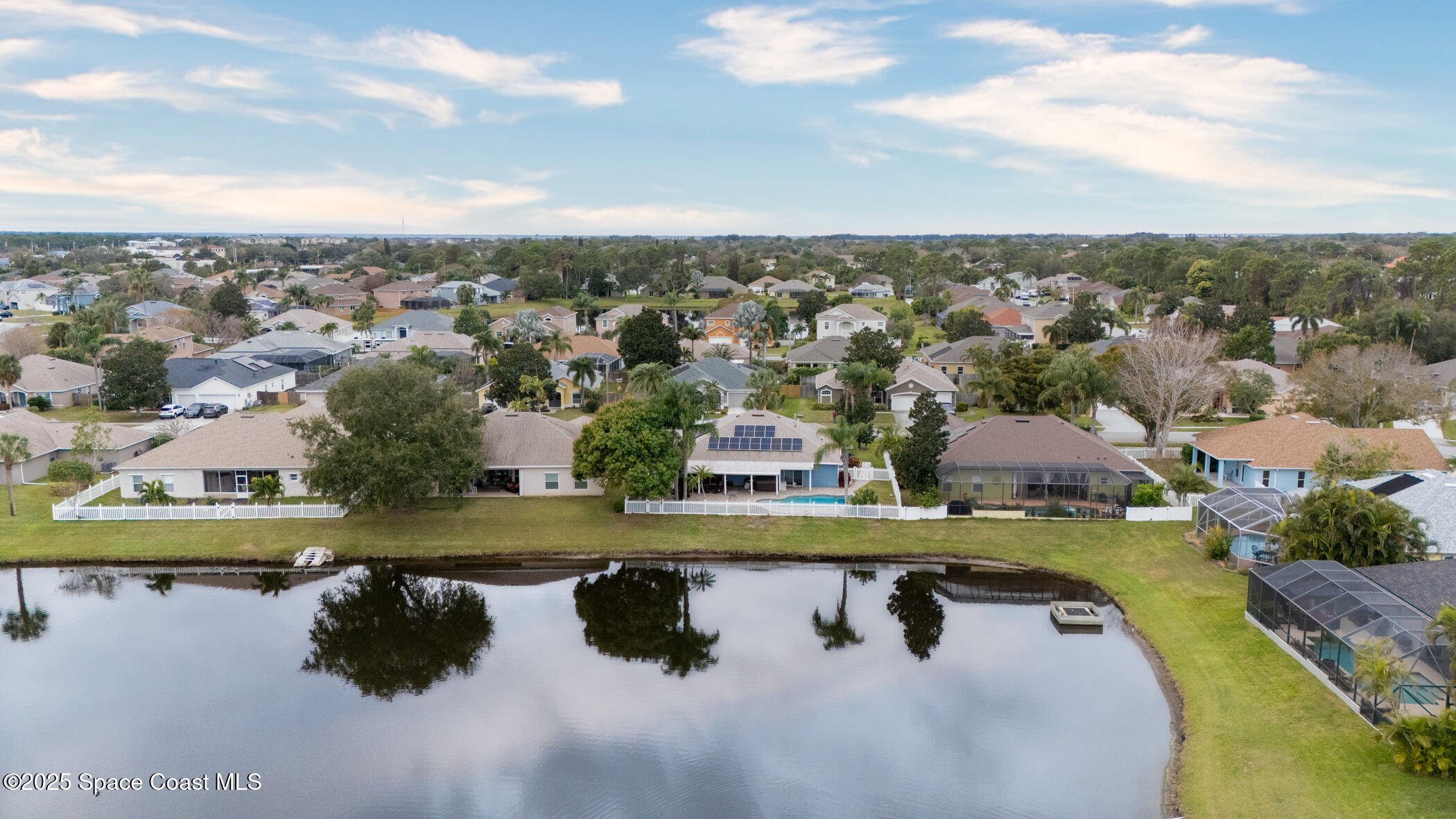 443 Wenthrop Circle Rockledge, FL 32955 - Photo 32 of 38 an aerial view of residential houses with outdoor space and lake view