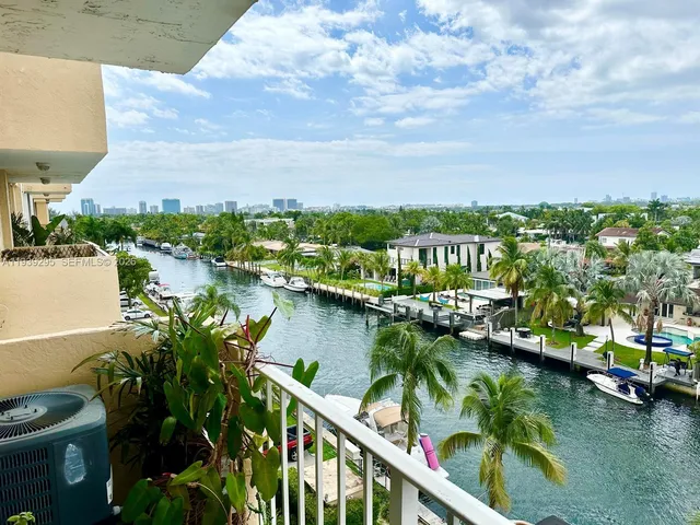 a view of boats and a lake view
