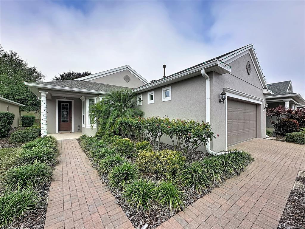 front view of house with a small yard