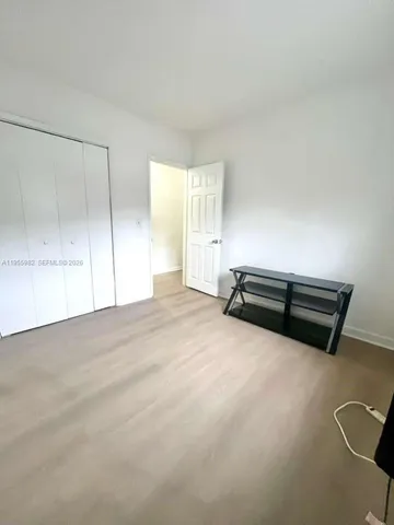 a view of a livingroom with a staircase