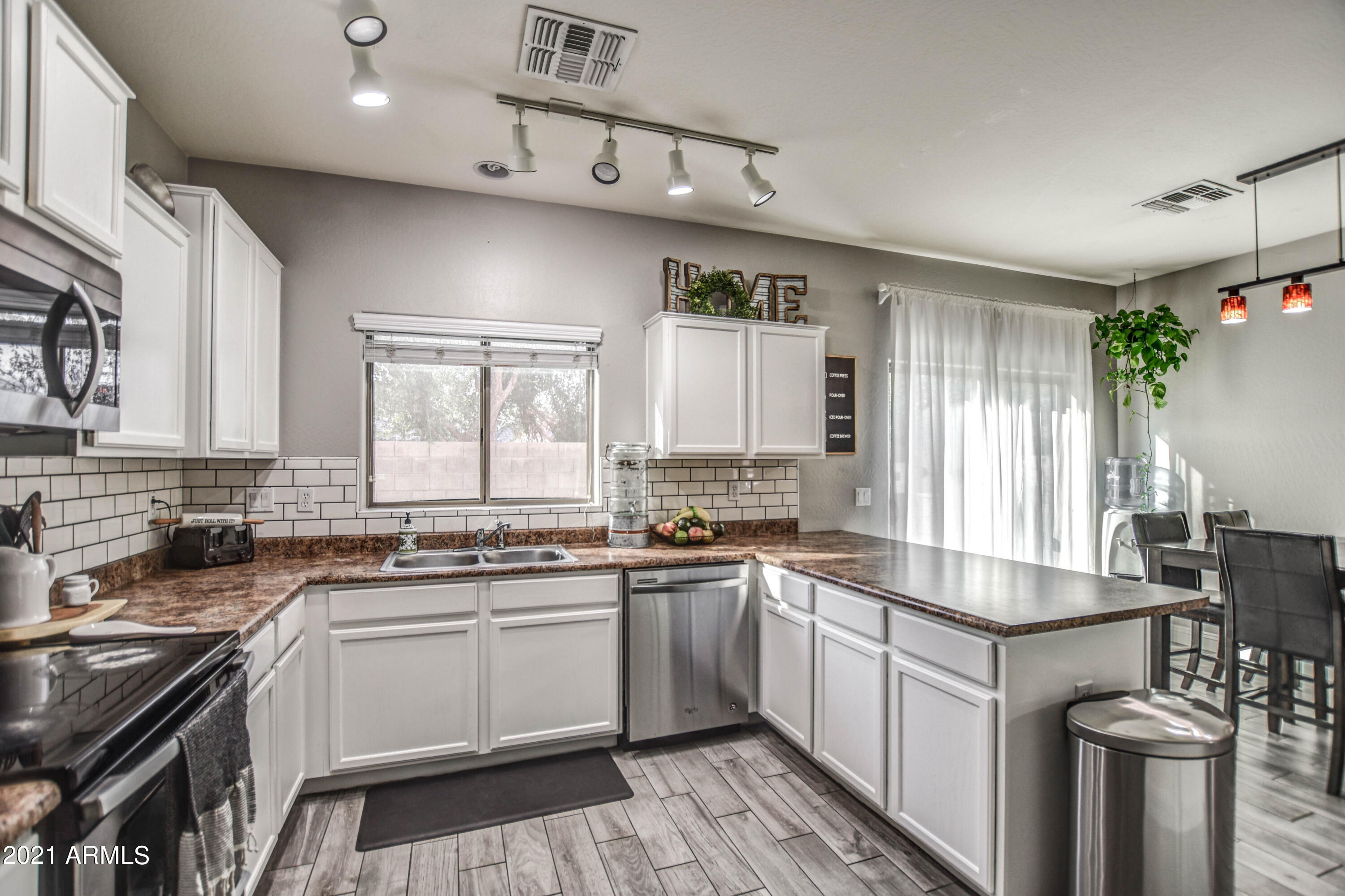 10225 West Camelback Road, Unit 49 Phoenix, AZ 85037 - Photo 11 of 31 KITCHEN 4