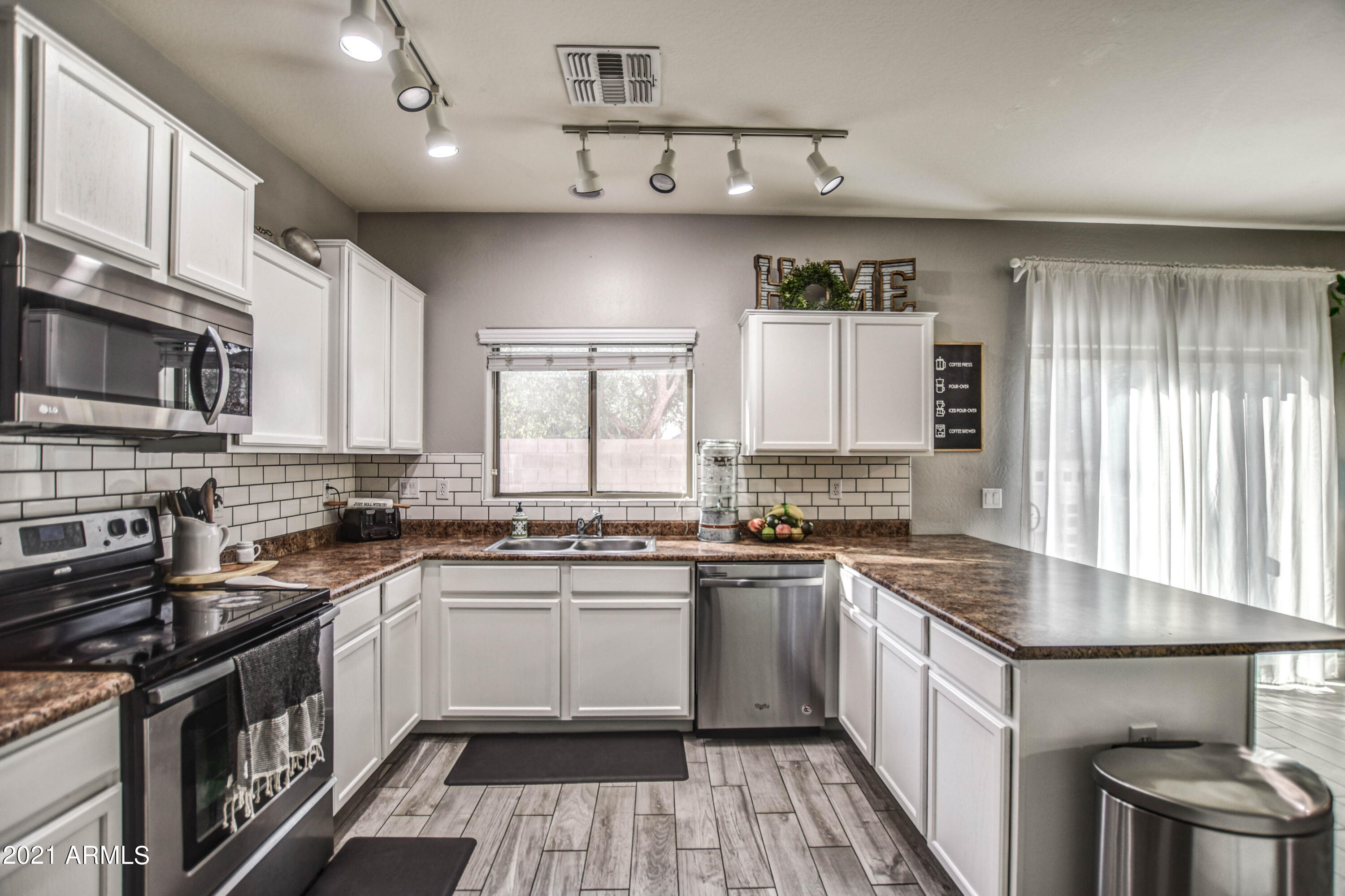 10225 West Camelback Road, Unit 49 Phoenix, AZ 85037 - Photo 12 of 31 KITCHEN 5